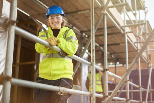 An apprentice in safety workwear