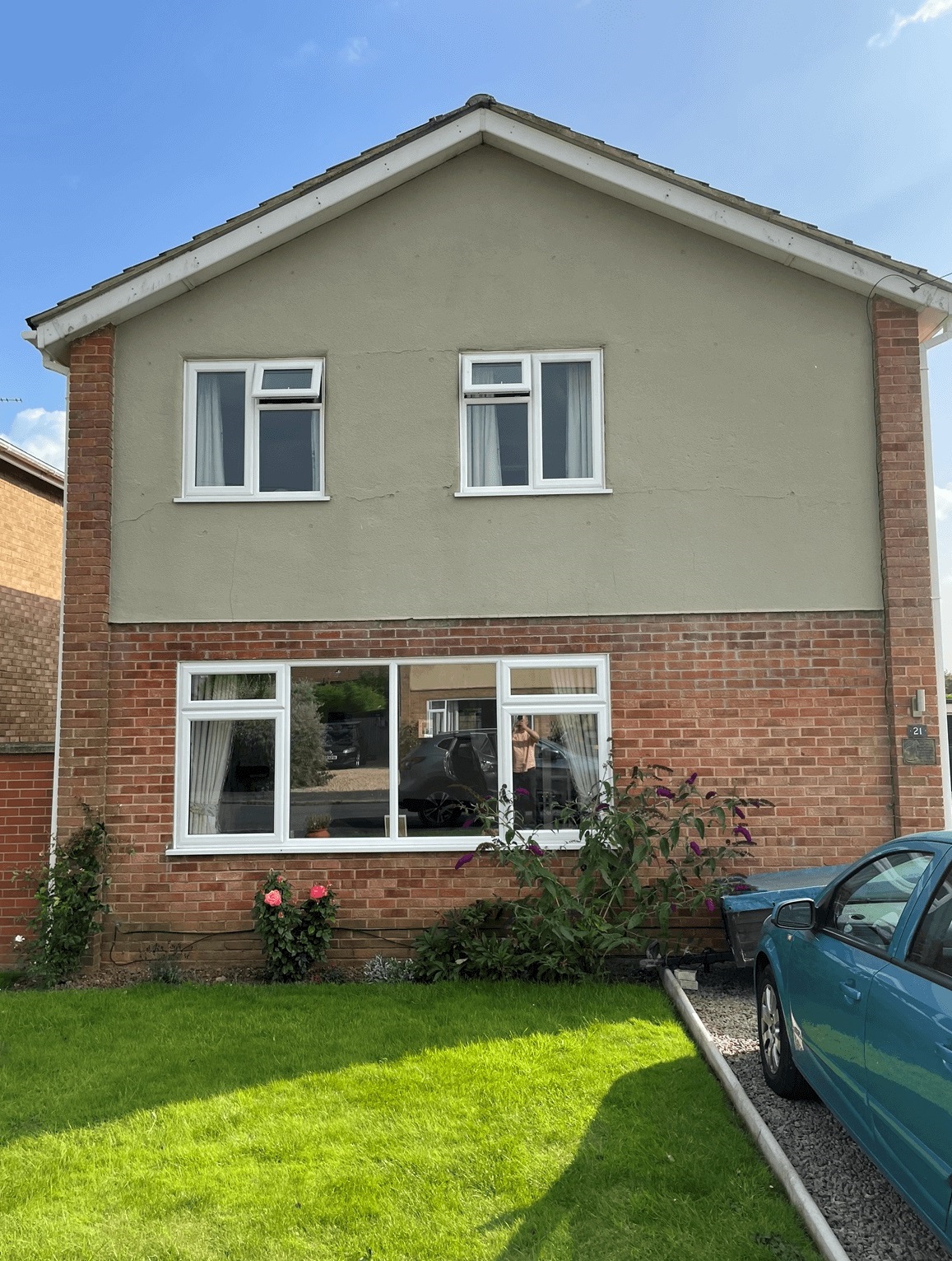 Before and after images of a Peterborough property clad in Freefoam Fortex.