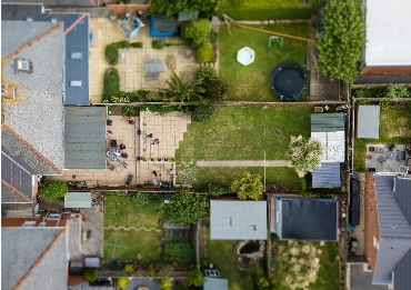An aerial view of three urban gardens