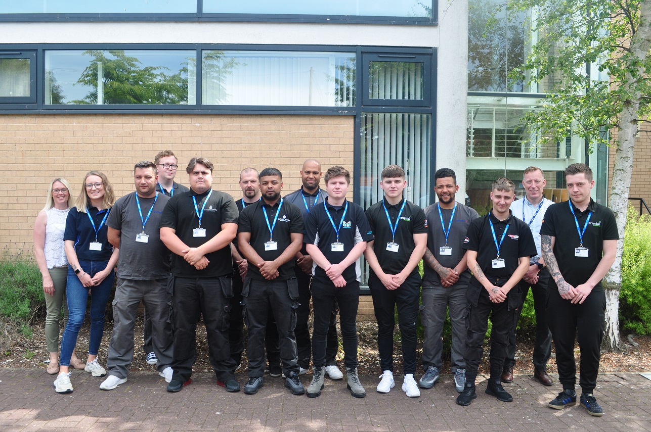 The third cohort at South Staffs College outside the building