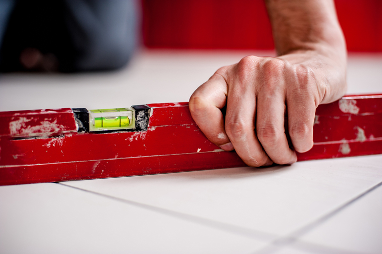 Holding a spirit level