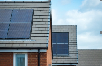 A house with a solar panel on roof