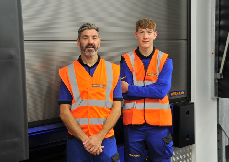 2 guys in high vis jackets