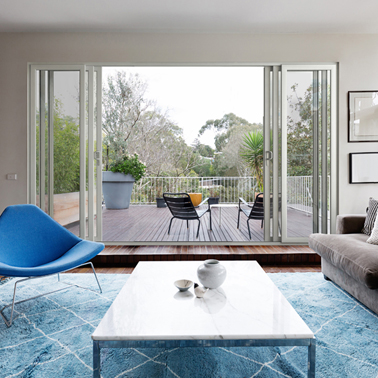 View out of patio doors onto a decked patio