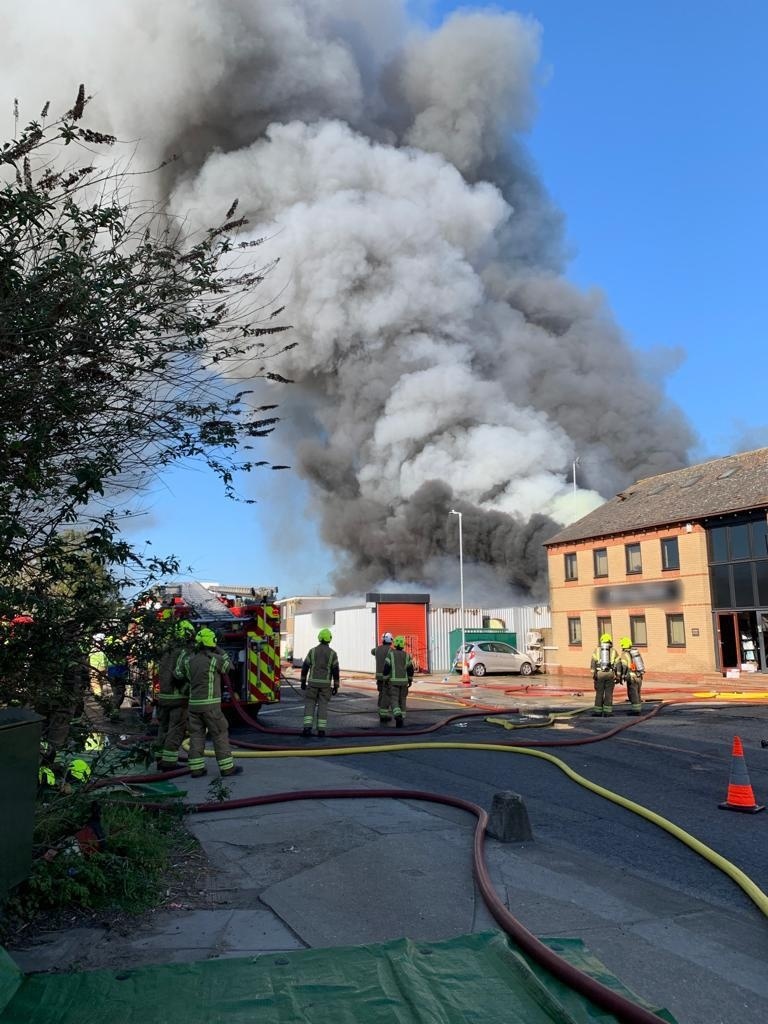 Firemen putting out a fire in a building