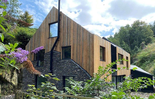 Converted Milll nestled under a cliff in Cumbria